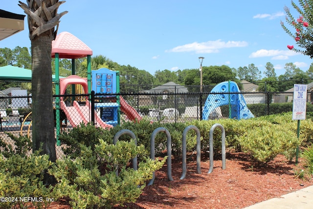 community play area featuring fence