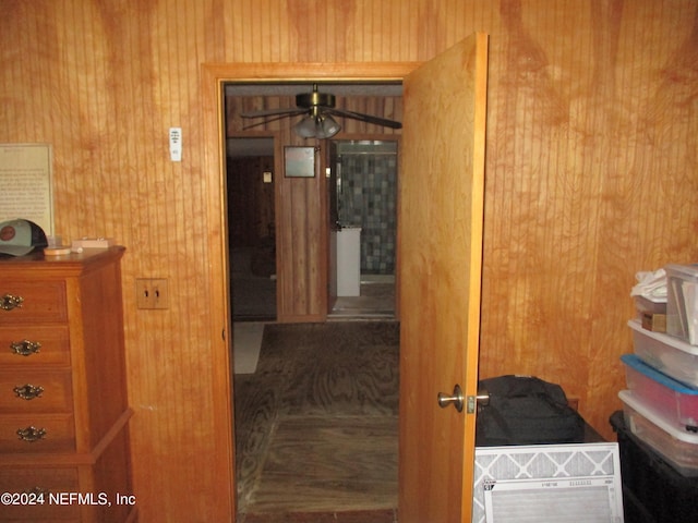 interior space featuring wood walls