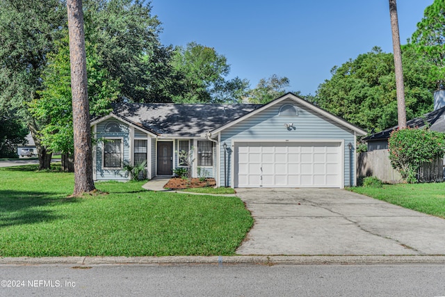 single story home with a front yard and a garage