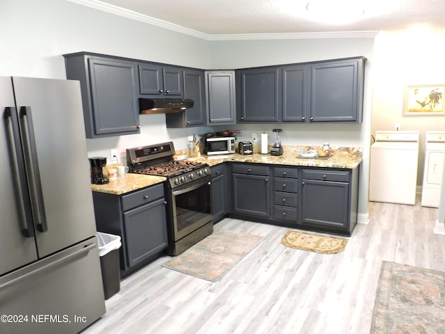 kitchen featuring gray cabinets, light hardwood / wood-style flooring, stainless steel appliances, washer and dryer, and ornamental molding