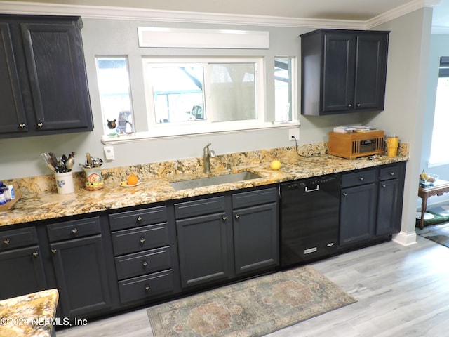 kitchen with a healthy amount of sunlight, sink, light wood-type flooring, and black dishwasher