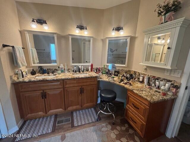 bathroom with oversized vanity