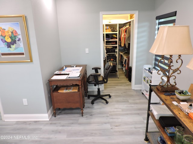 office with wood-type flooring