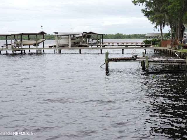 view of dock with a water view