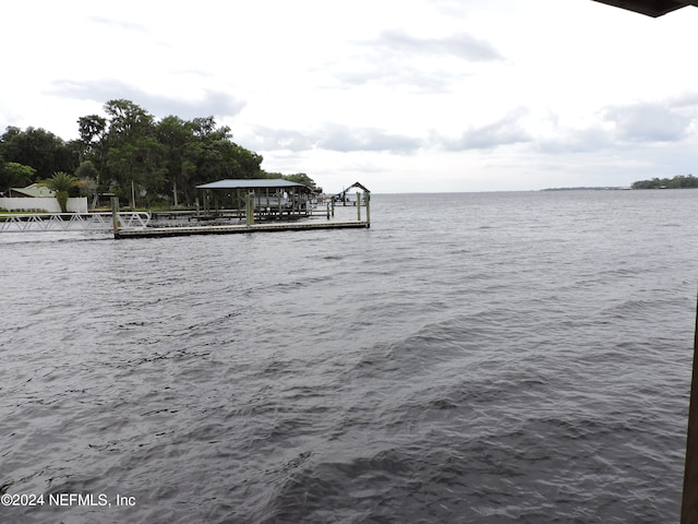 view of dock with a water view