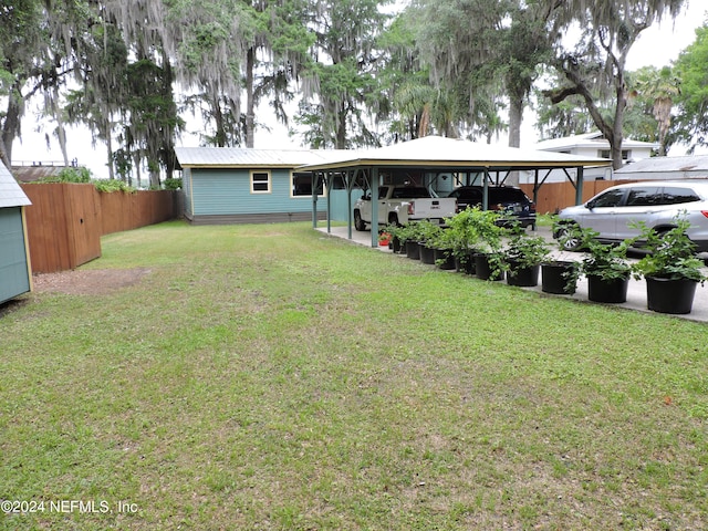 exterior space featuring a carport and a storage unit