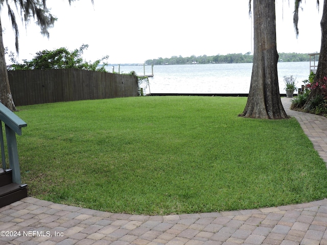 view of yard with a water view