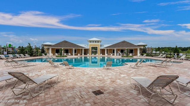 view of swimming pool featuring a patio