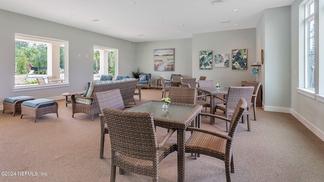 view of carpeted dining area