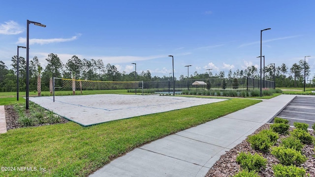 view of nearby features with volleyball court and a yard