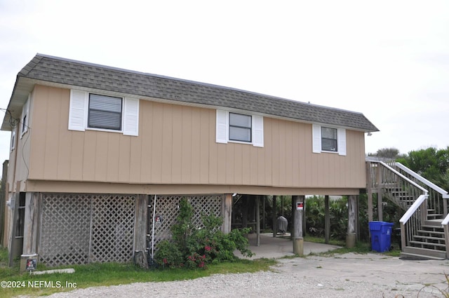 view of front of property with a carport