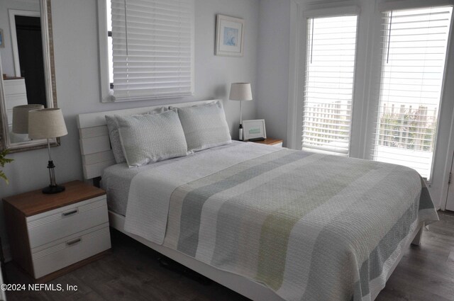 bedroom featuring dark hardwood / wood-style floors