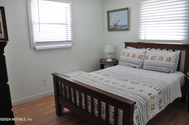 bedroom featuring dark hardwood / wood-style floors