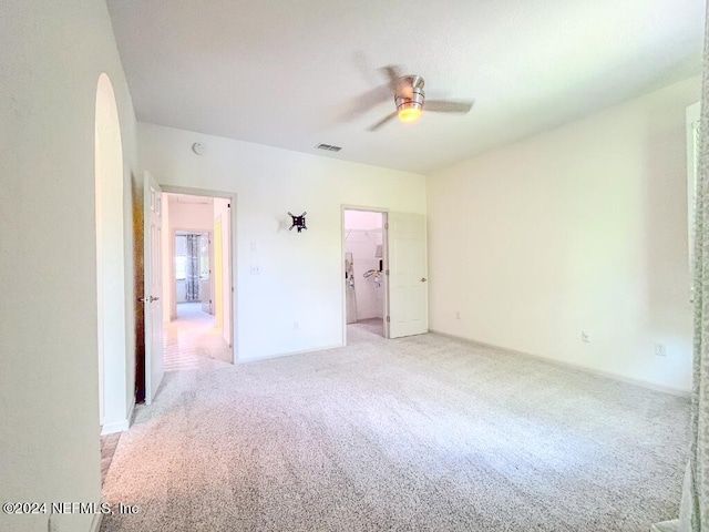 carpeted empty room with ceiling fan