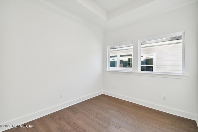 empty room with wood-type flooring