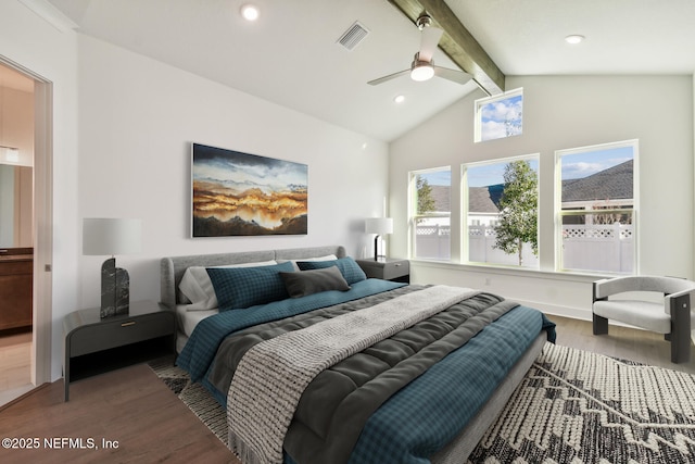 bedroom featuring ceiling fan, wood-type flooring, and lofted ceiling with beams