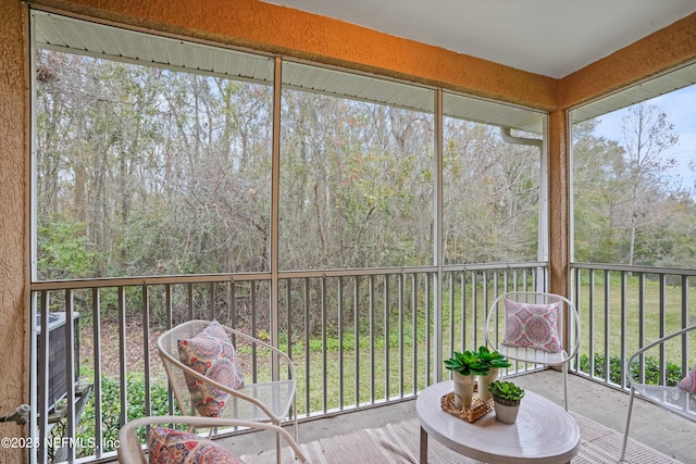 unfurnished sunroom with a healthy amount of sunlight