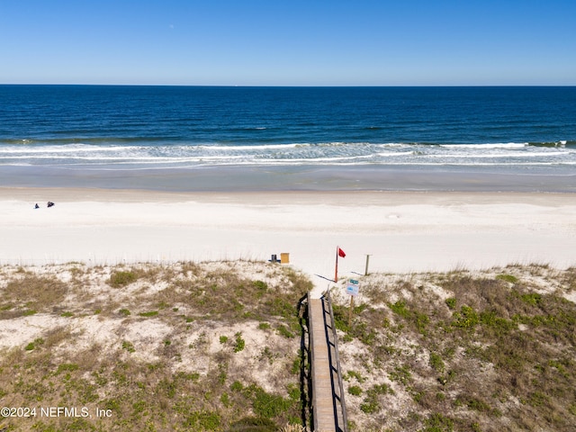 property view of water featuring a beach view