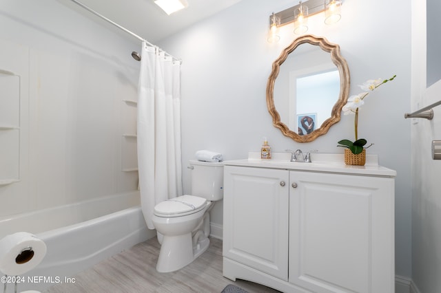 full bathroom featuring vanity, toilet, and shower / bath combo with shower curtain