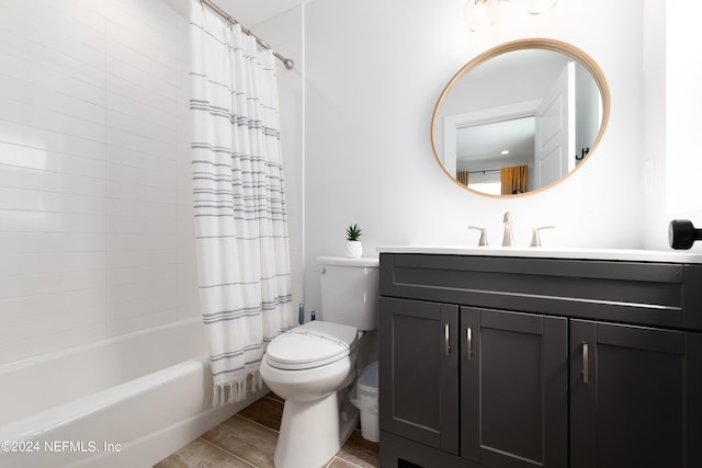 full bathroom with shower / tub combo, vanity, and toilet