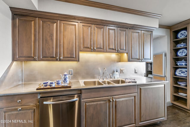 kitchen with dishwasher, dark hardwood / wood-style flooring, built in features, and sink