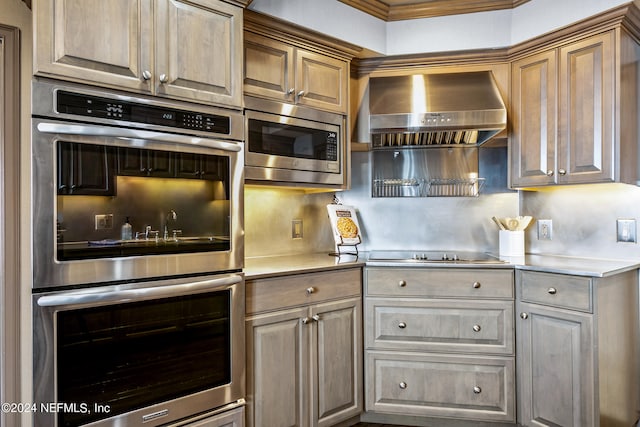 kitchen with backsplash, stainless steel appliances, crown molding, and wall chimney exhaust hood