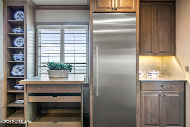 kitchen featuring built in fridge