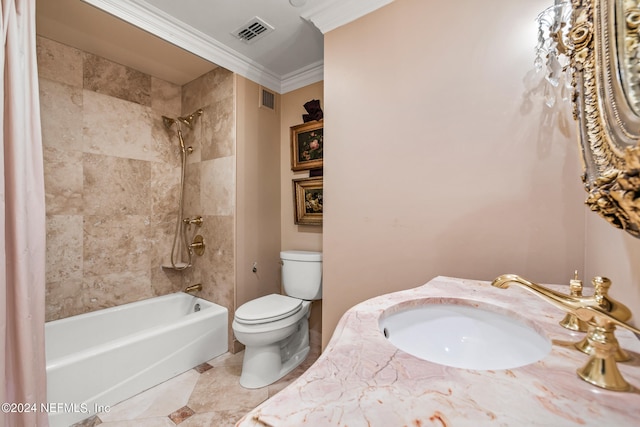 full bathroom with crown molding, sink, tile patterned flooring, toilet, and tiled shower / bath