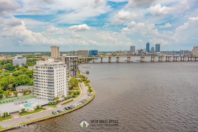 birds eye view of property featuring a water view