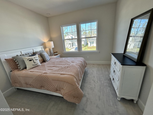 bedroom featuring baseboards