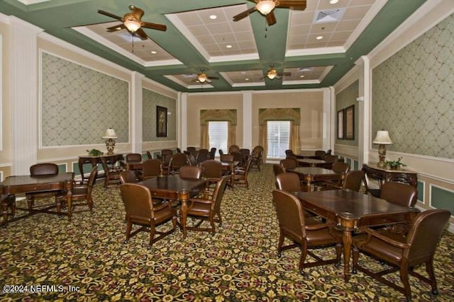 dining room featuring carpet, coffered ceiling, crown molding, ceiling fan, and beamed ceiling