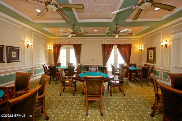 rec room featuring carpet flooring, a healthy amount of sunlight, coffered ceiling, and ornamental molding