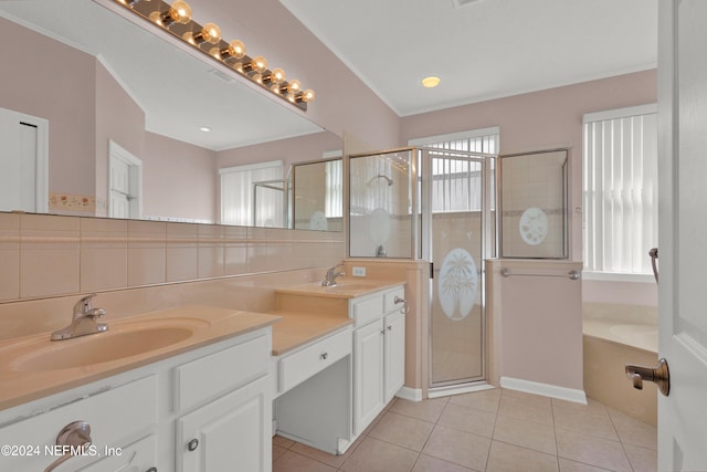 bathroom with separate shower and tub, backsplash, tile patterned flooring, and vanity