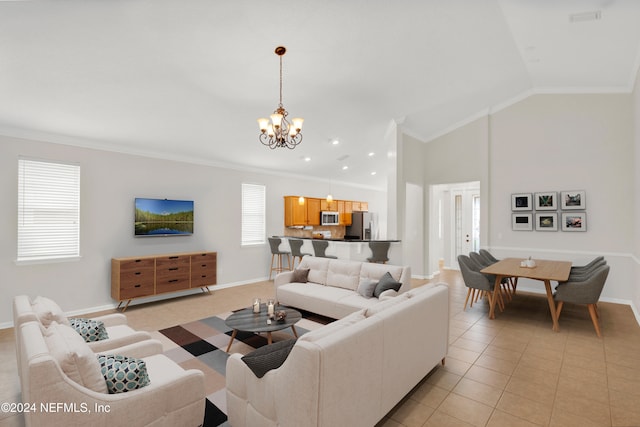 living room featuring a chandelier, light tile patterned floors, crown molding, and vaulted ceiling