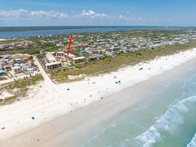 aerial view with a beach view and a water view