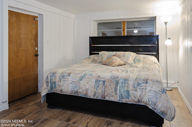 bedroom featuring wood-type flooring