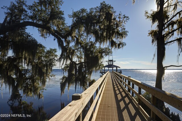 view of dock with a water view