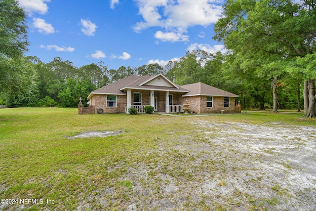 view of front of property with a front lawn