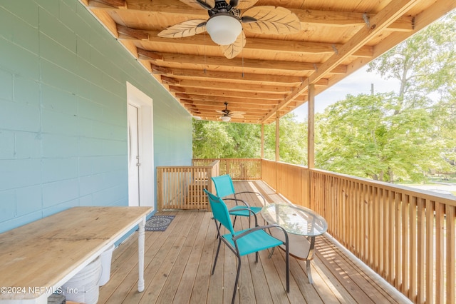 wooden deck with ceiling fan