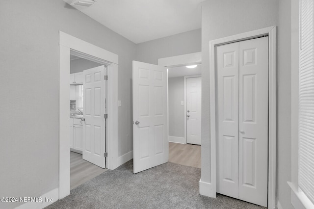 interior space with light colored carpet