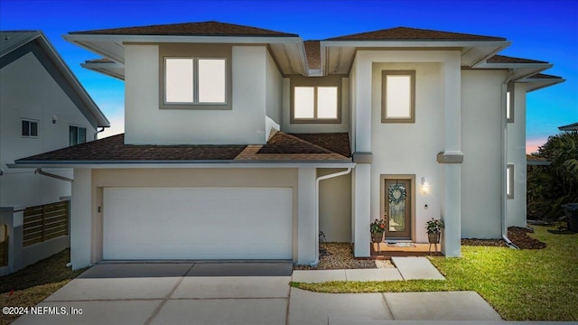 prairie-style home with a garage