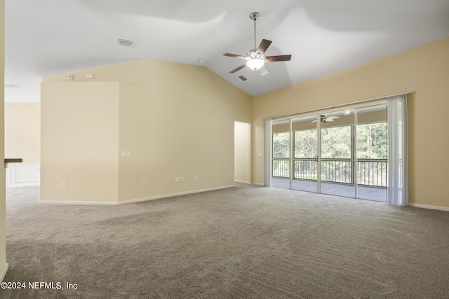 spare room featuring carpet flooring, high vaulted ceiling, and ceiling fan