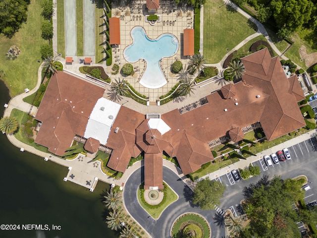 drone / aerial view with a water view