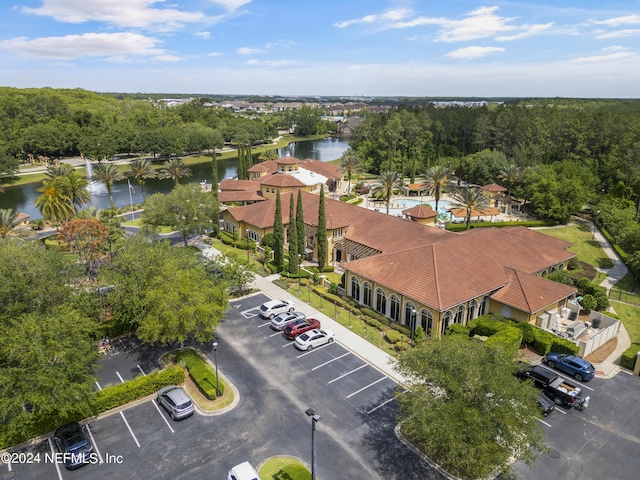 drone / aerial view with a water view