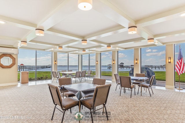 sunroom with coffered ceiling, beamed ceiling, a water view, and a wall mounted air conditioner