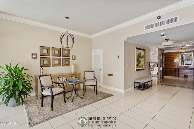 tiled dining area featuring ornamental molding