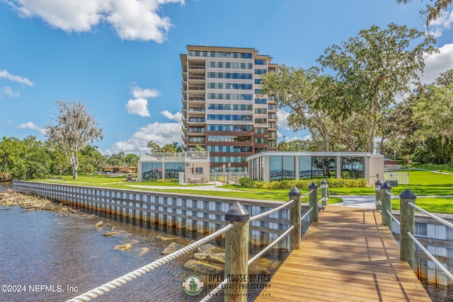 dock area with a water view