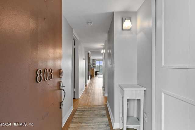 hall featuring hardwood / wood-style floors