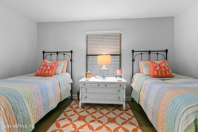 bedroom with wood-type flooring