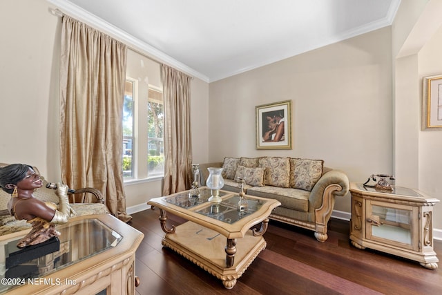 living room with dark hardwood / wood-style flooring and crown molding